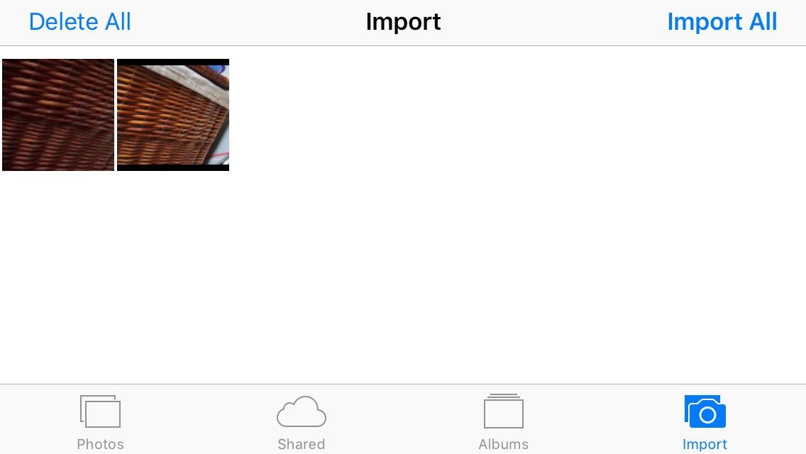 Screenshot from iPhone 5 iOS 10.3.3 showing both photo and video files on SD card for import