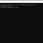 Command Prompt showing commands to take ownership and grant permissions to a system file