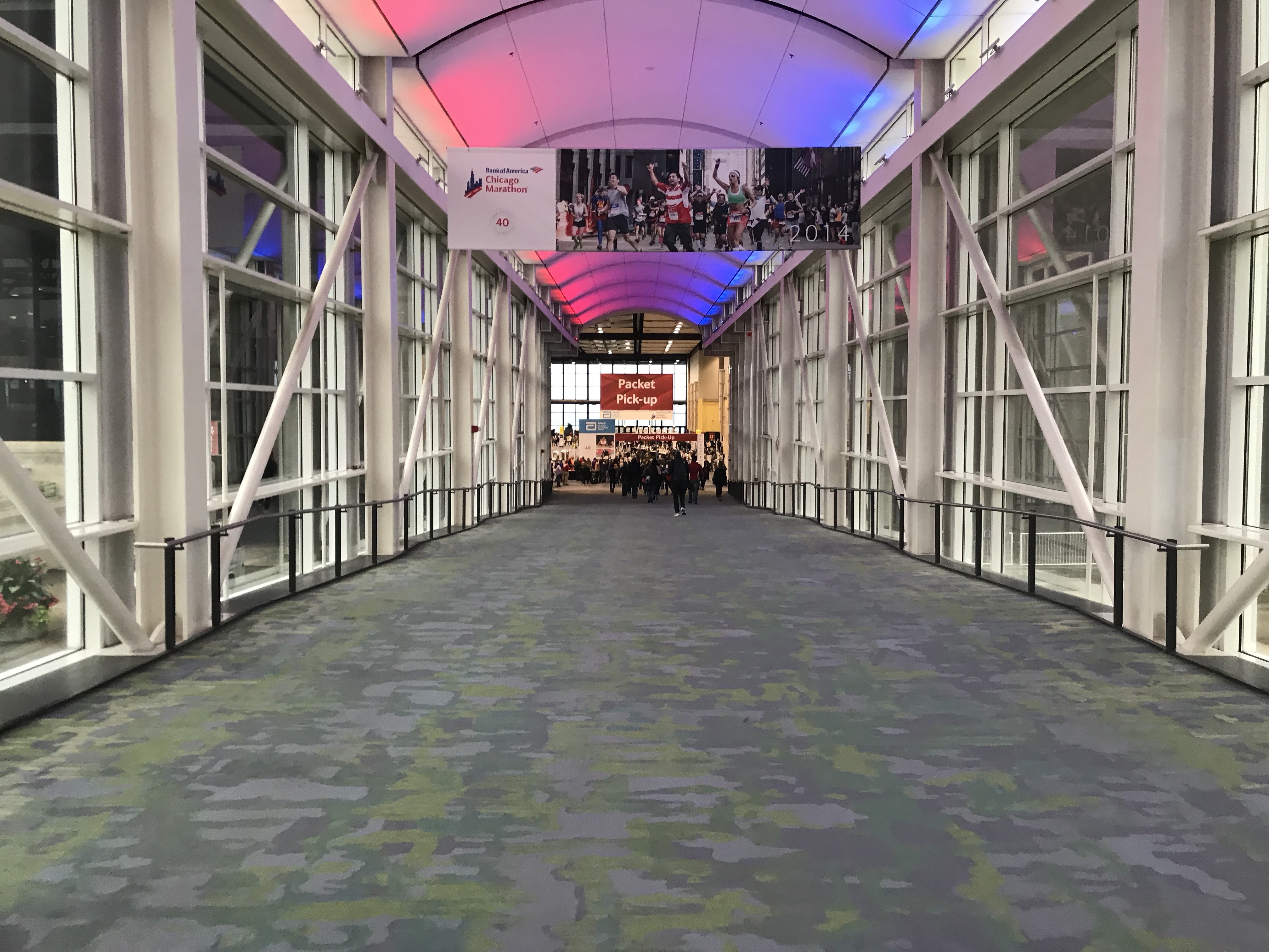 Picking up race bibs and shirts at the Chicago Marathon Expo, a quick and efficient process.