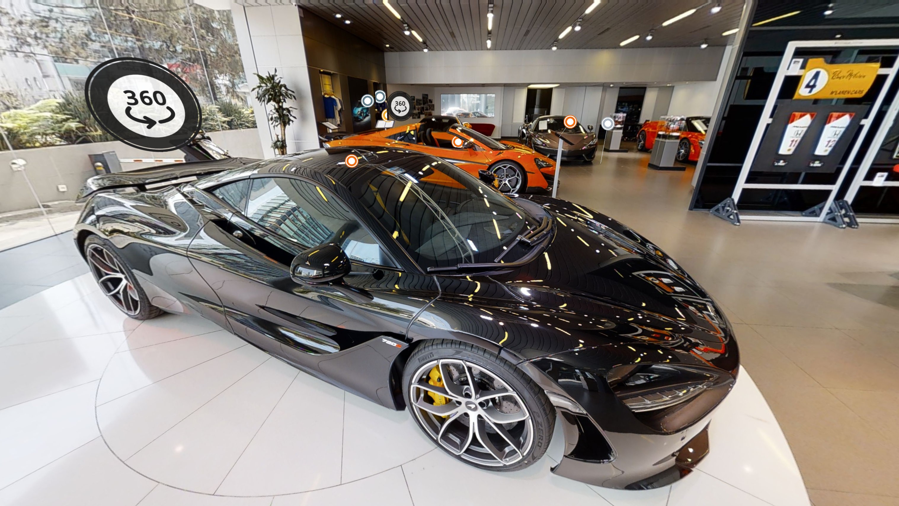 McLaren sports car models showcased in a Mexico City showroom, captured with Matterport scan