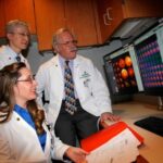 Medical professionals at ChristianaCare discuss the benefits of cardiac PET scan technology for improved heart health diagnoses.