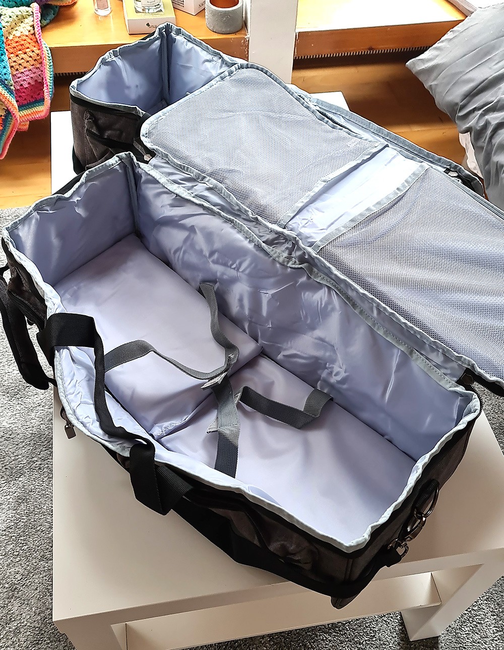 Two grey Brother Scan N Cut carrying cases are shown straight out of the box, unfolded with padded bottoms inserted, suggesting ample room for machines.